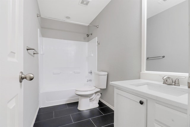 full bathroom featuring vanity, tile patterned floors, washtub / shower combination, and toilet