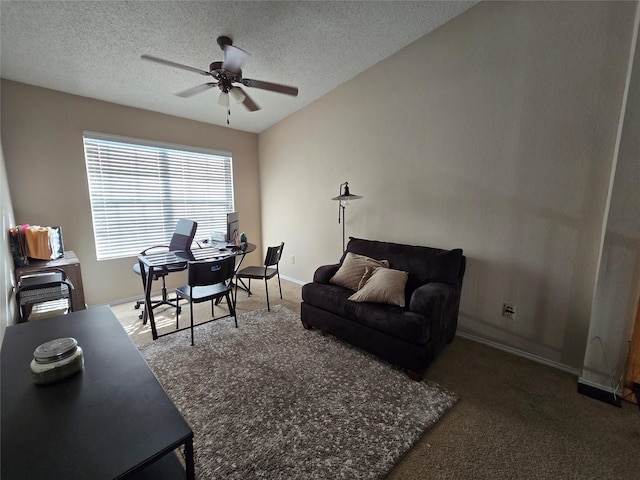 living room with ceiling fan, a textured ceiling, and dark carpet