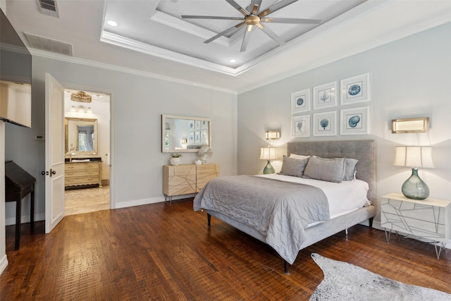 bedroom featuring crown molding, ceiling fan, connected bathroom, wood-type flooring, and a raised ceiling