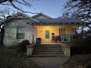 bungalow-style home featuring covered porch