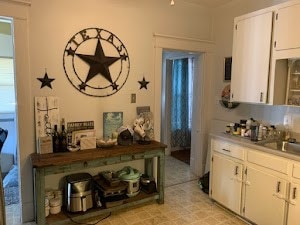 kitchen with white cabinets