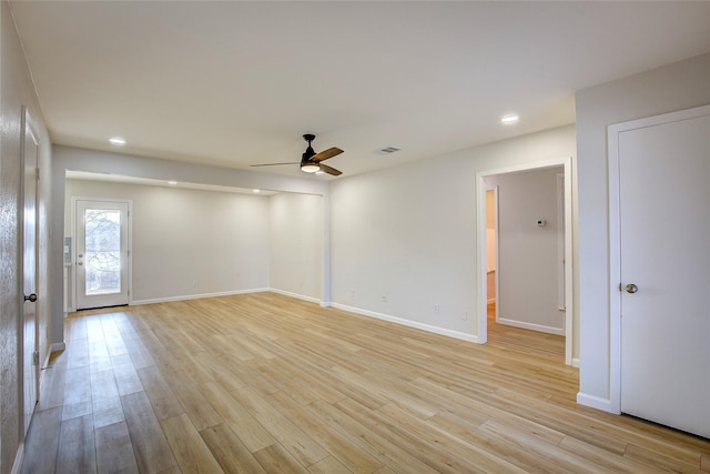 unfurnished room featuring light wood finished floors, baseboards, a ceiling fan, and recessed lighting