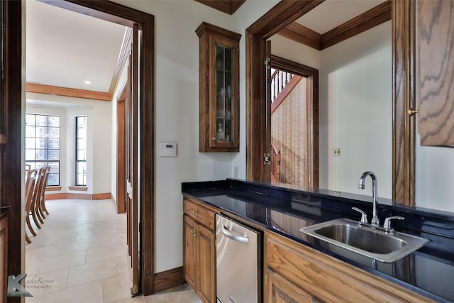 kitchen featuring sink and crown molding