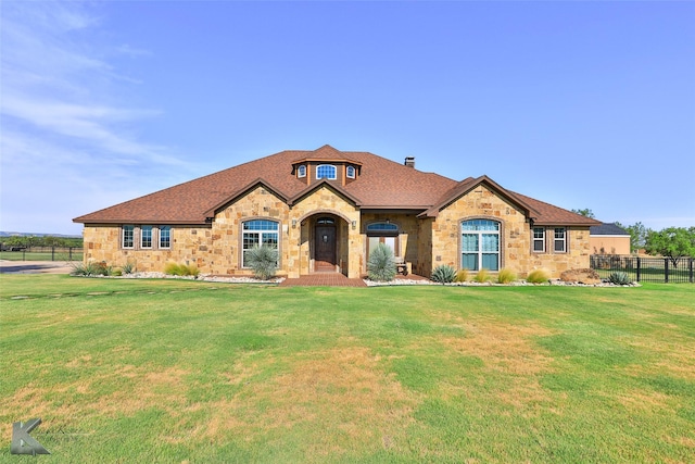 view of front of home featuring a front lawn