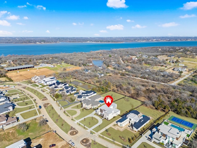 aerial view with a residential view and a water view