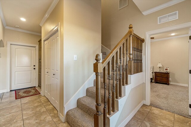 597 Imagine Dr, Lindale, TX 75771 - staircase with crown molding and carpet flooring
