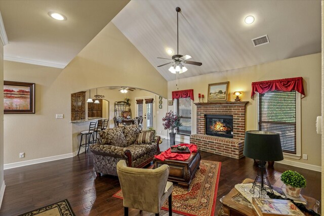 597 Imagine Dr, Lindale, TX 75771 - living room featuring ceiling fan, high vaulted ceiling, dark hardwood / wood-style floors, and a fireplace
