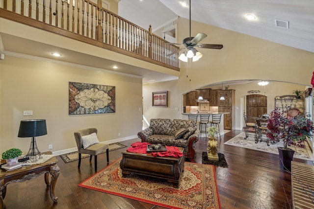 597 Imagine Dr, Lindale, TX 75771 - living room with ceiling fan, high vaulted ceiling, crown molding, and dark hardwood / wood-style flooring