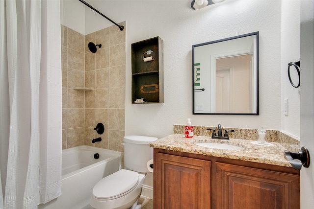 full bathroom featuring shower / tub combo with curtain, vanity, and toilet