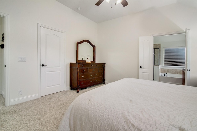 bedroom with lofted ceiling, ceiling fan, and carpet