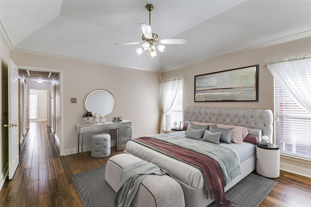 bedroom with multiple windows, ornamental molding, and dark hardwood / wood-style floors