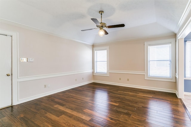 spare room featuring ornamental molding, ceiling fan, and dark hardwood / wood-style flooring