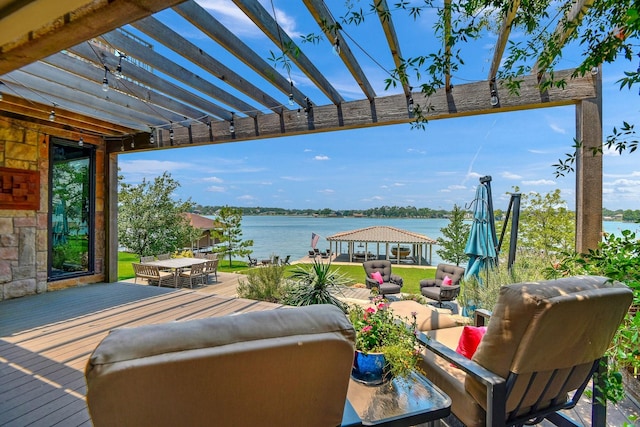 wooden terrace with a gazebo, a water view, outdoor lounge area, and a pergola