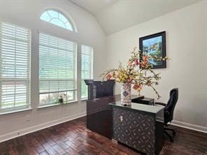 office space featuring vaulted ceiling and dark wood-type flooring