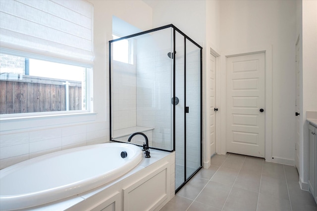3512 Pritchard Rd, Celina, TX 75009 - full bath with a garden tub, a stall shower, tile patterned flooring, and vanity