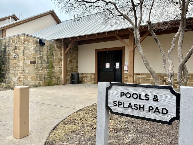 property entrance featuring cooling unit