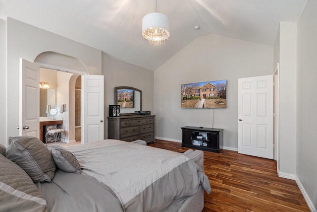 bedroom with high vaulted ceiling and dark hardwood / wood-style flooring