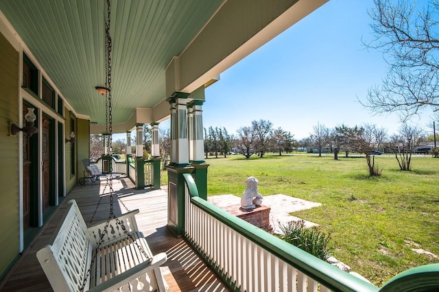 balcony featuring a porch