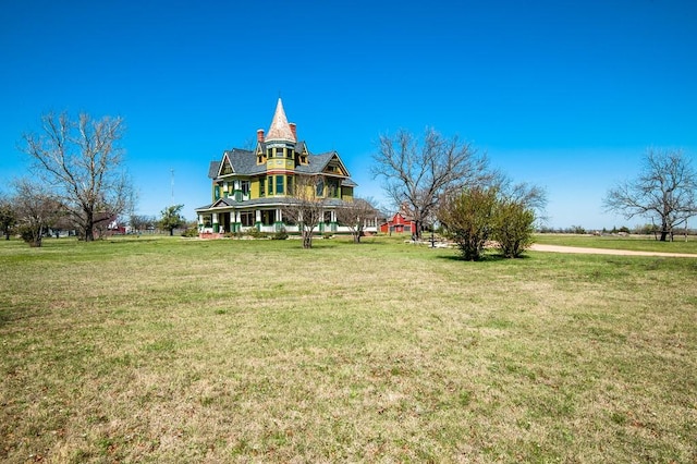 exterior space featuring a lawn