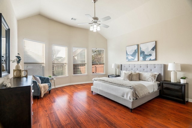 bedroom with ceiling fan, lofted ceiling, and dark hardwood / wood-style flooring