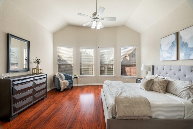 bedroom with vaulted ceiling, dark hardwood / wood-style floors, and ceiling fan