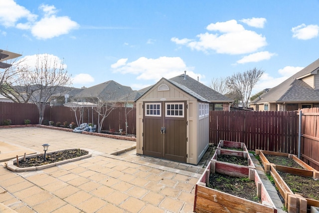 view of patio with a storage shed