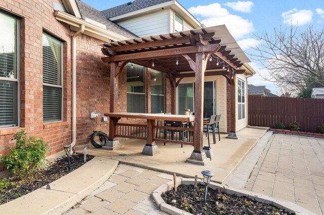 view of patio featuring a pergola