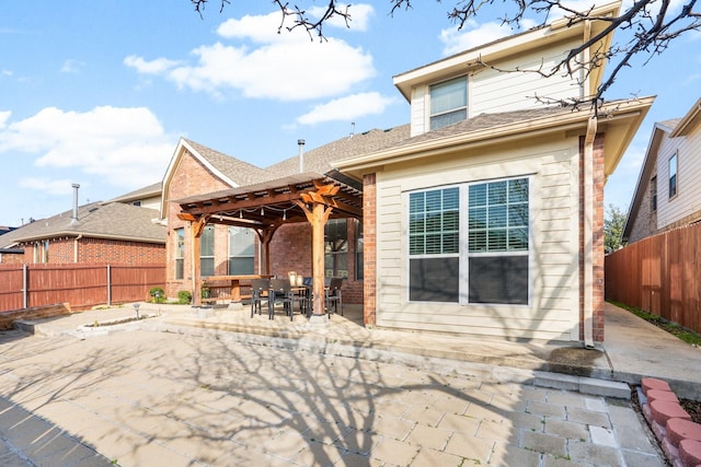 back of house featuring a patio