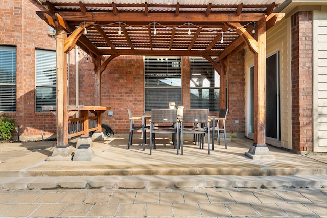 view of patio featuring a pergola