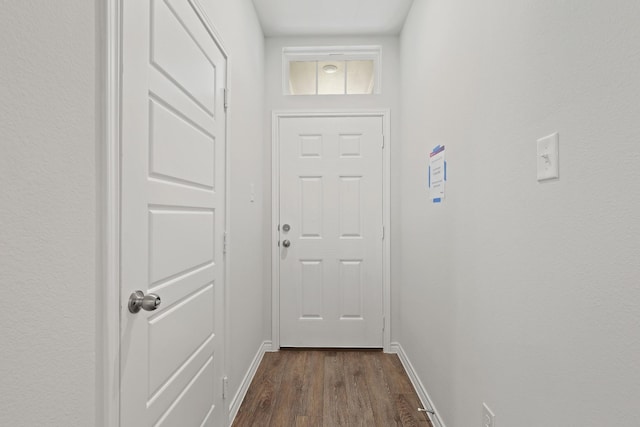 2413 Dahlia Dr, Fort Worth, TX 76123 - doorway featuring dark wood-style floors and baseboards