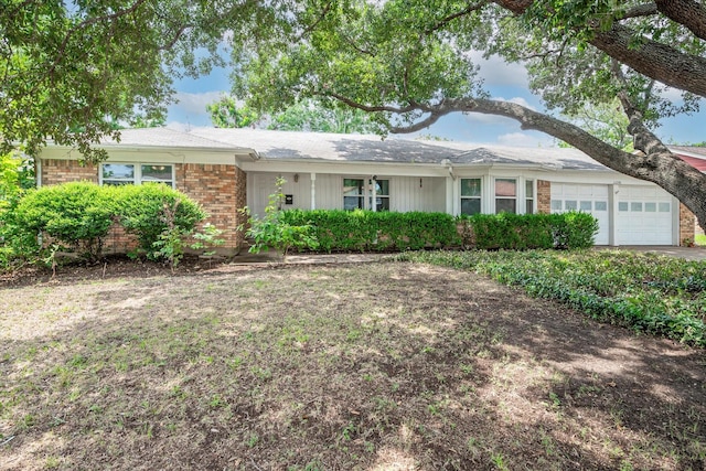 single story home featuring a garage