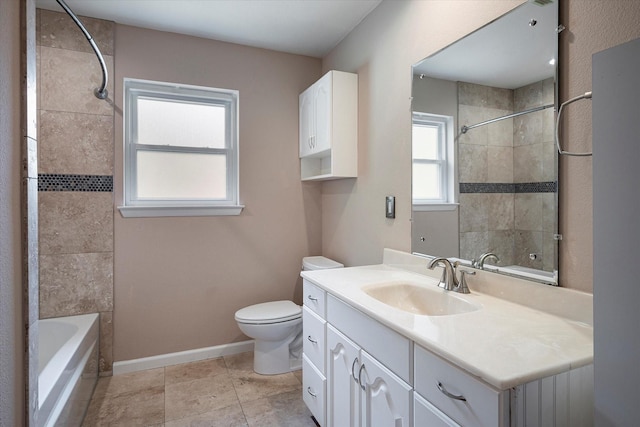 full bathroom featuring vanity, tile patterned flooring, tiled shower / bath combo, and toilet