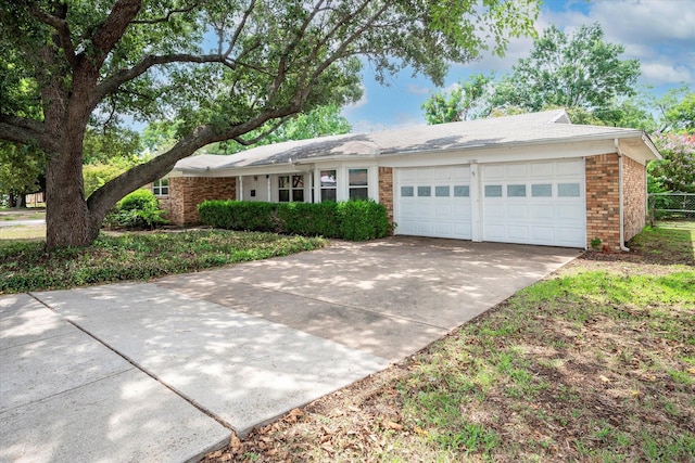 ranch-style house featuring a garage