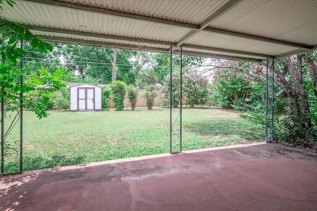 view of patio / terrace featuring a storage shed