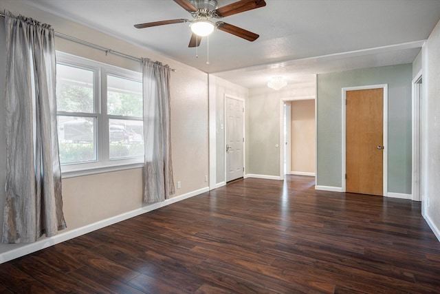 unfurnished bedroom with dark wood-type flooring and ceiling fan