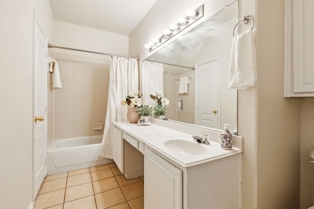 bathroom with shower / bathtub combination with curtain, vanity, and tile patterned floors