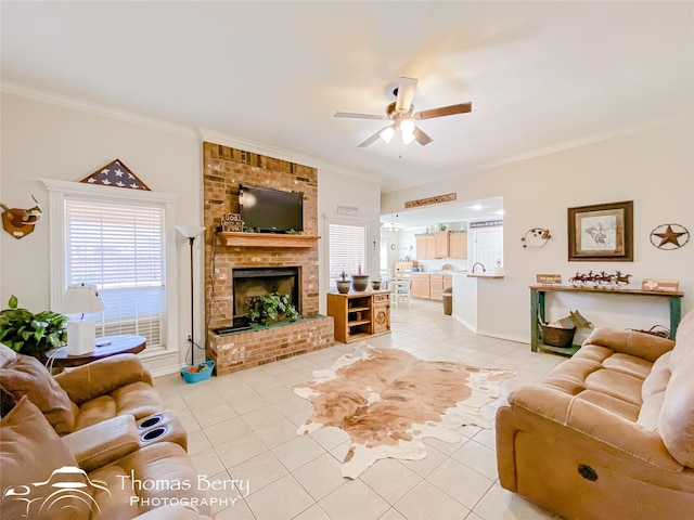 tiled living room with a brick fireplace, a wealth of natural light, and ornamental molding