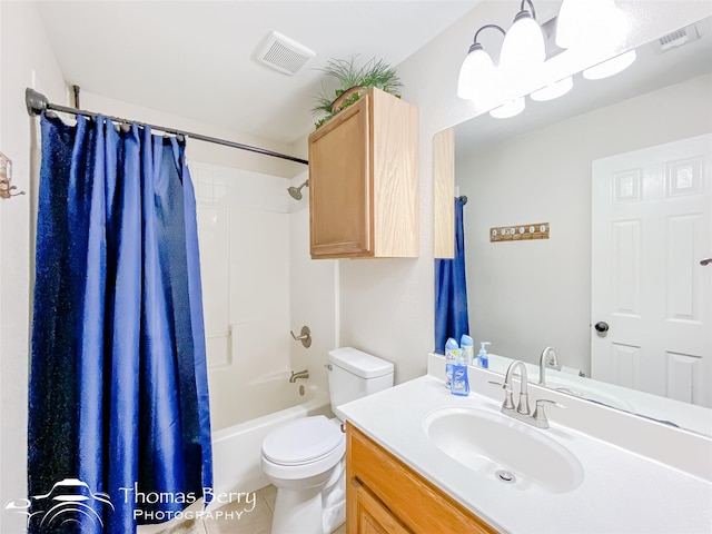 full bathroom with vanity, toilet, and shower / tub combo