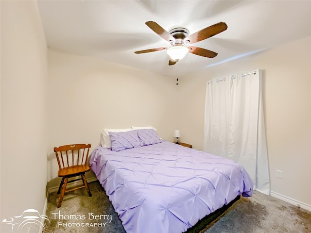 bedroom with ceiling fan and carpet flooring