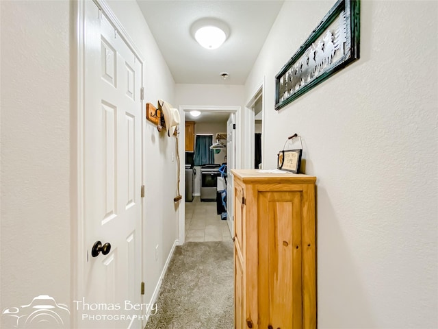 corridor with light colored carpet