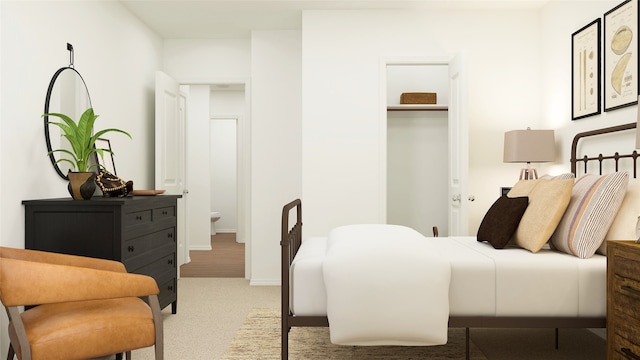 carpeted bedroom featuring a closet