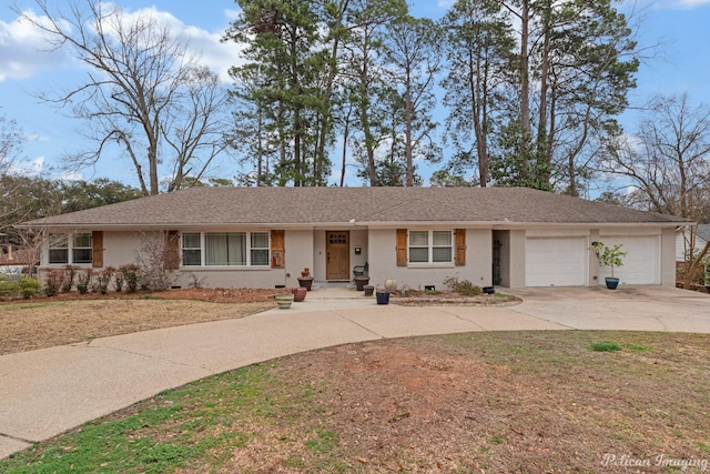 ranch-style home with a garage