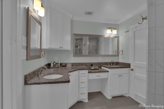 bathroom with ornamental molding, tile patterned flooring, and vanity