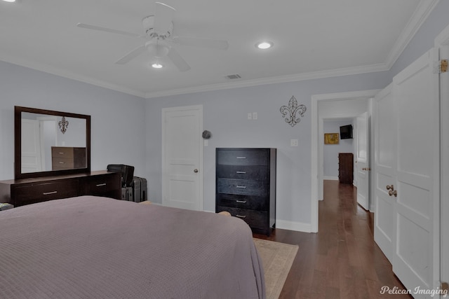 bedroom with ornamental molding, dark hardwood / wood-style floors, and ceiling fan