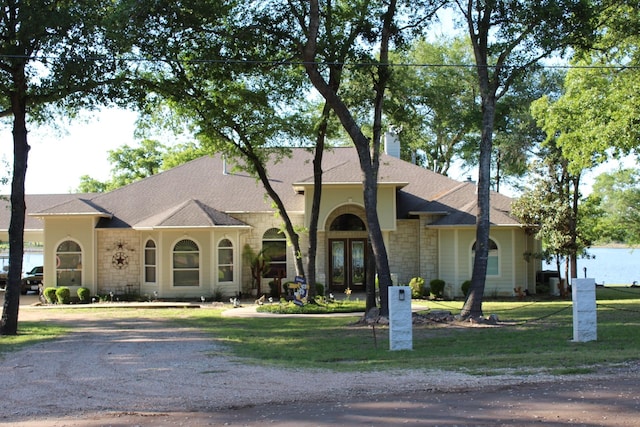 view of front of property with a front lawn