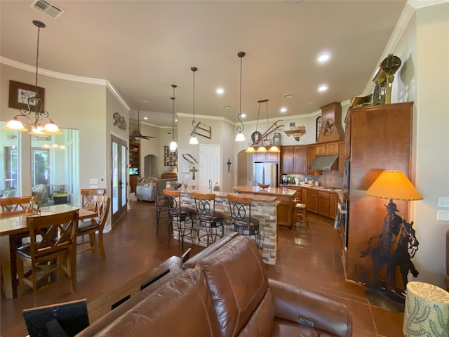 living room featuring crown molding