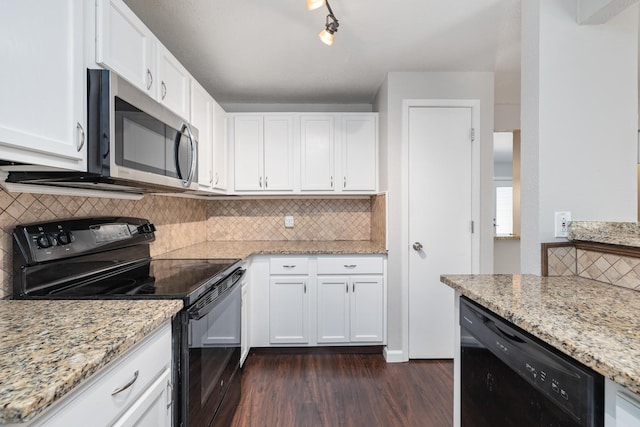 kitchen featuring tasteful backsplash, black appliances, dark hardwood / wood-style flooring, light stone countertops, and white cabinets