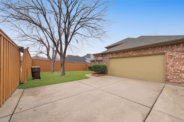 garage with a yard