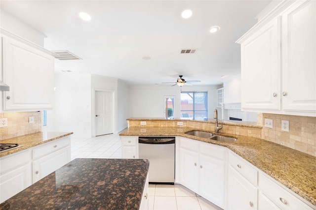 kitchen with white cabinetry, sink, dishwasher, and light tile patterned flooring