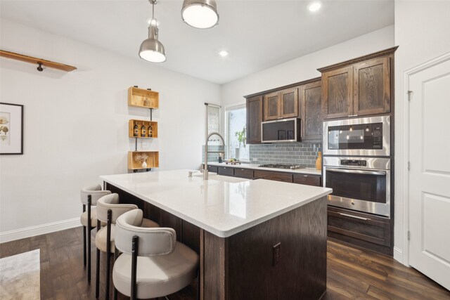 dining space featuring dark hardwood / wood-style flooring